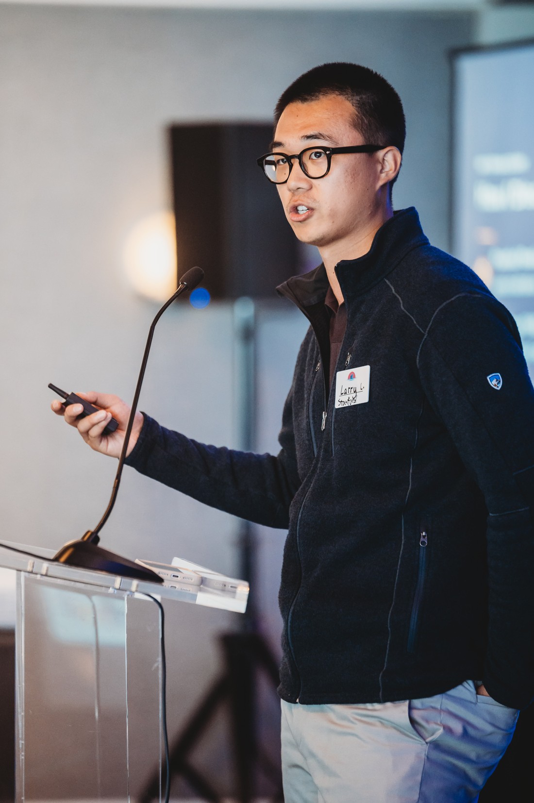 Larry Liu speaking at a FIRE event